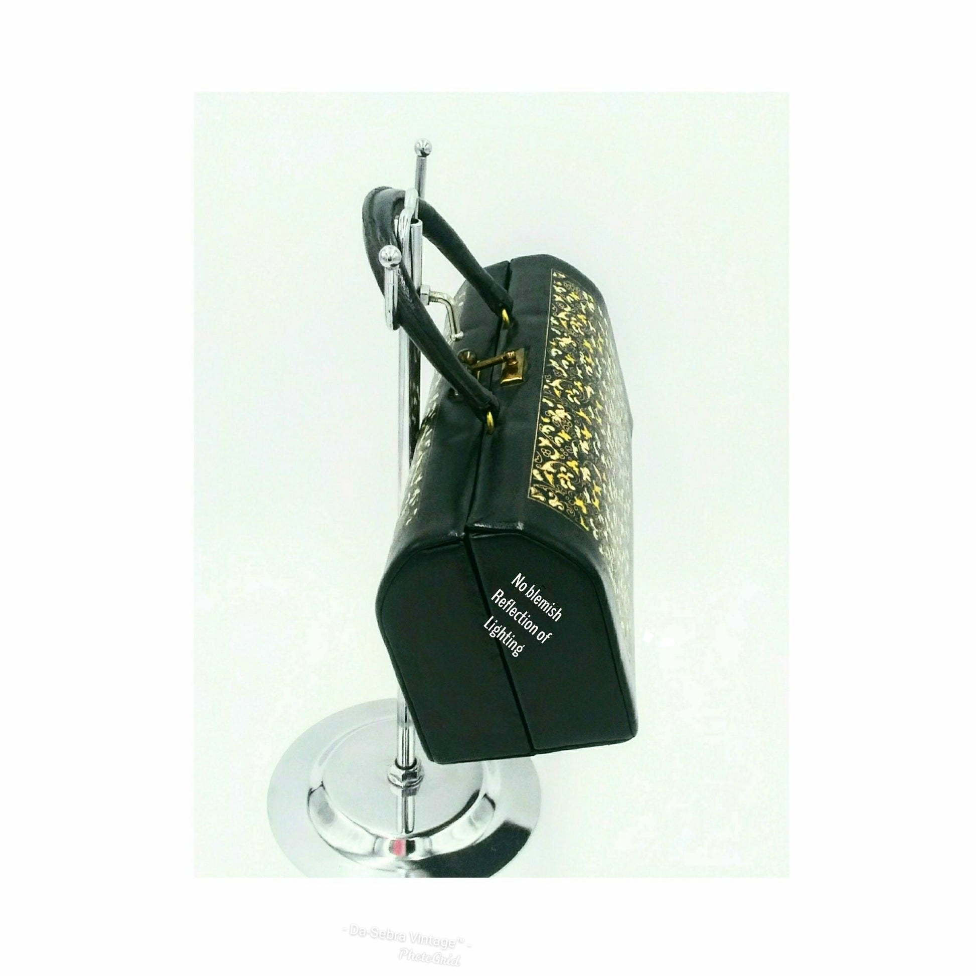 This rare 1950s vintage Mini Batik top-handle bag in a doctor's style