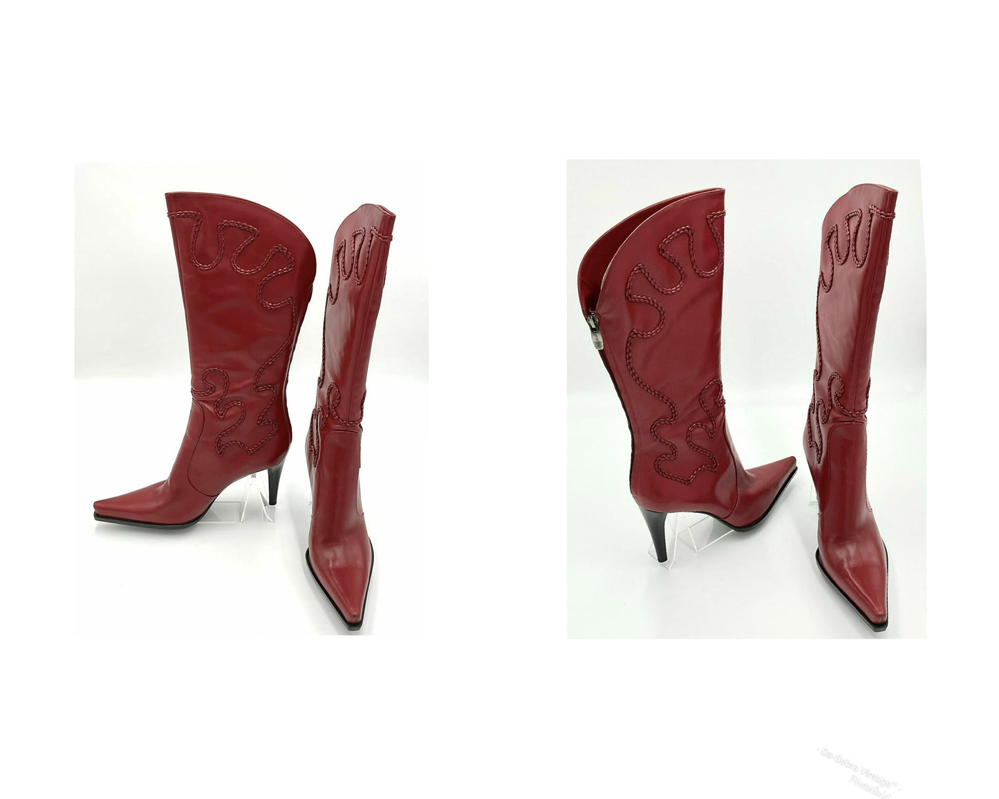Red cowboy boots with intricate designs on a white background