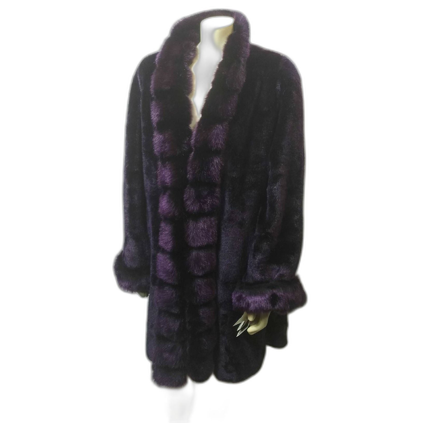 What a beautiful and gorgeous purple faux fur coat. Original tags, referred to as "Dead Stock" still attached and never worn.