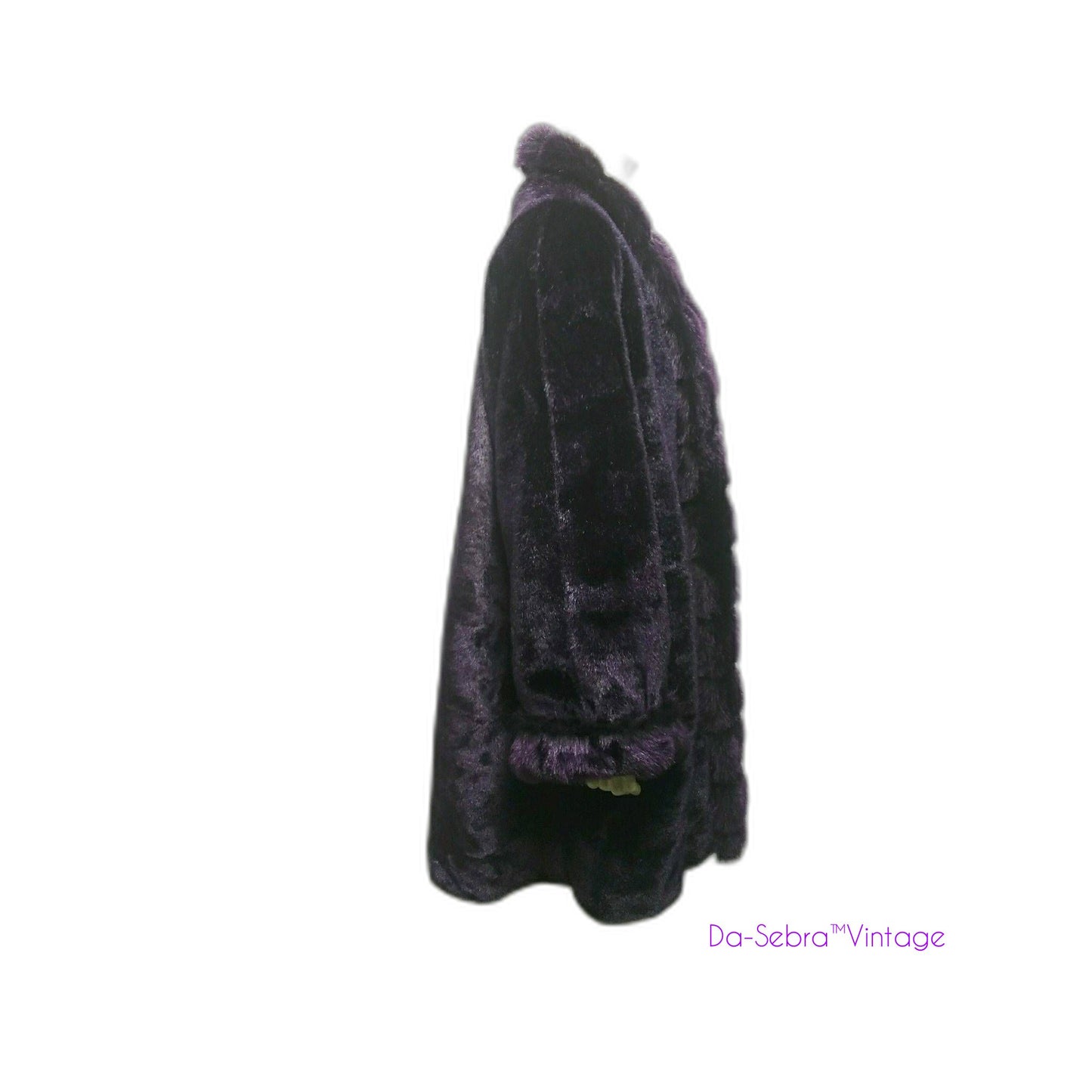 What a beautiful and gorgeous purple faux fur coat. Original tags, referred to as "Dead Stock" still attached and never worn.