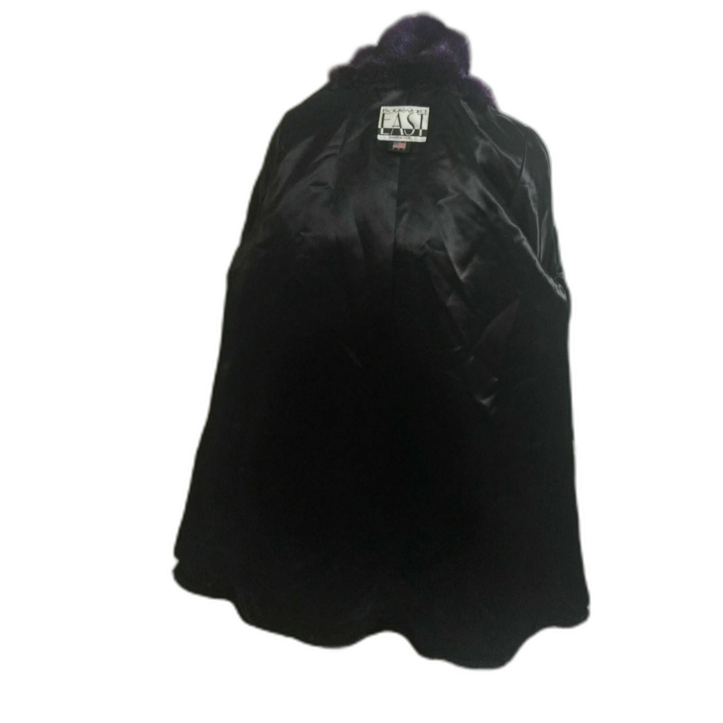 What a beautiful and gorgeous purple faux fur coat. Original tags, referred to as "Dead Stock" still attached and never worn.