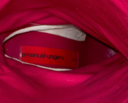 Brown  boots knee-high lizard skin print adorned with intricate sequins and floral details.  Close-up of a red fabric with an 'Emmanuel Ungaro' label.