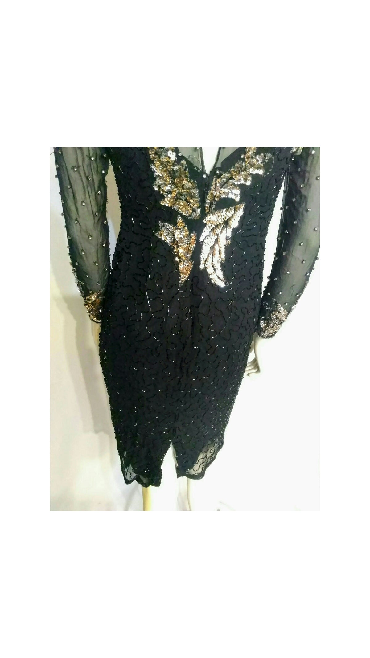 Showing the lower back of the dress to view the sequins next to zipper 