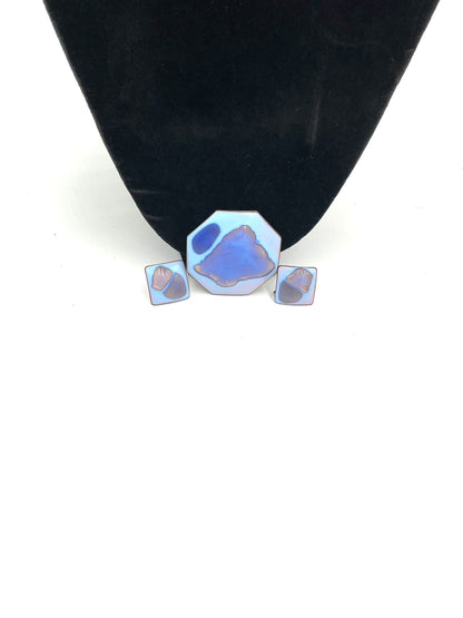 Brooch and Earrings in  color palette is exceptional: a striking opalescent blue enamel with beautiful hints of lavender and purple tones metal,