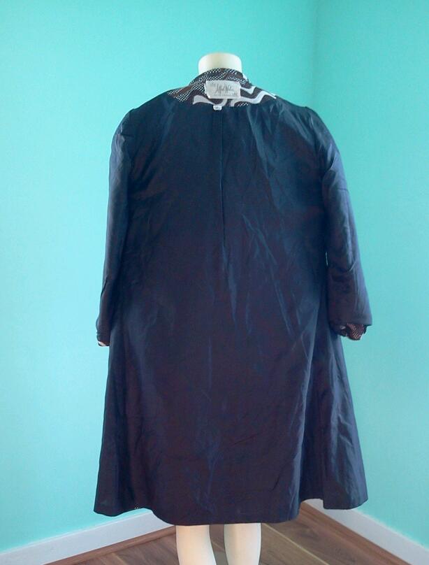 Showing inside of coat lining- black