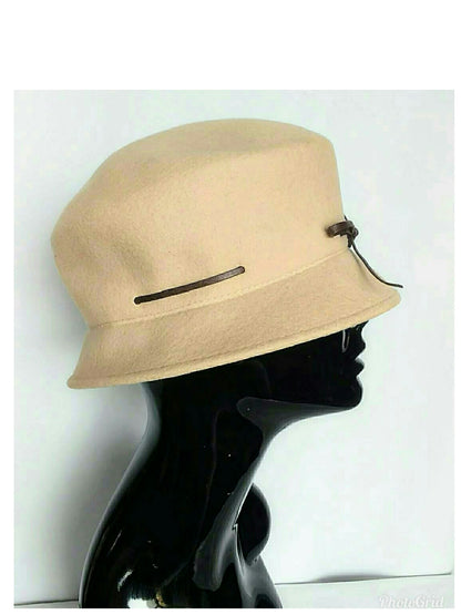 Right side of Camel colored felt cloche hat with a dark brown leather strap detail, displayed on a black mannequin head against a white background.